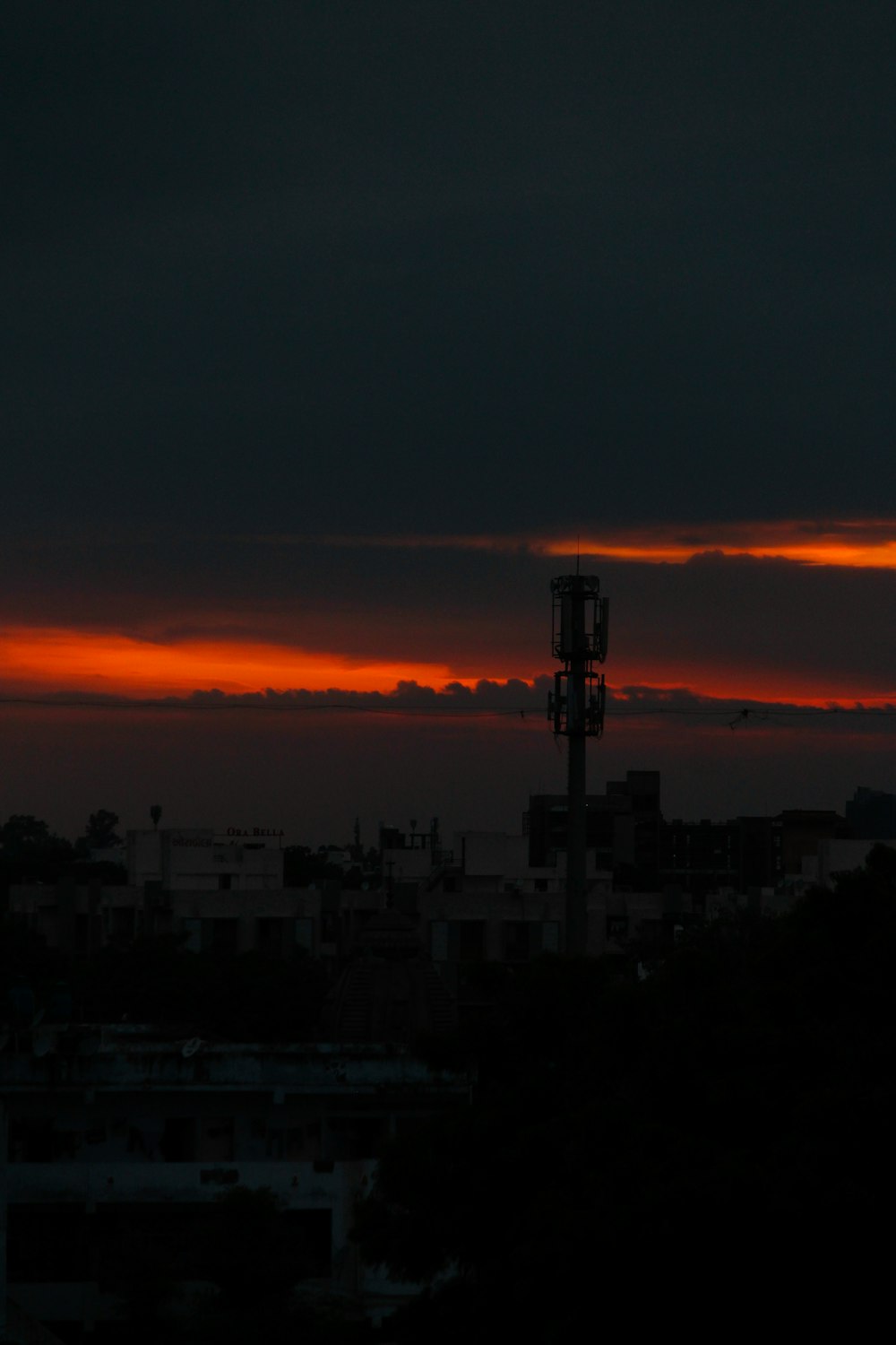 buildings under cloudy sky during sunset