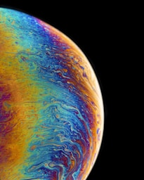 multicolored planet fluid painting