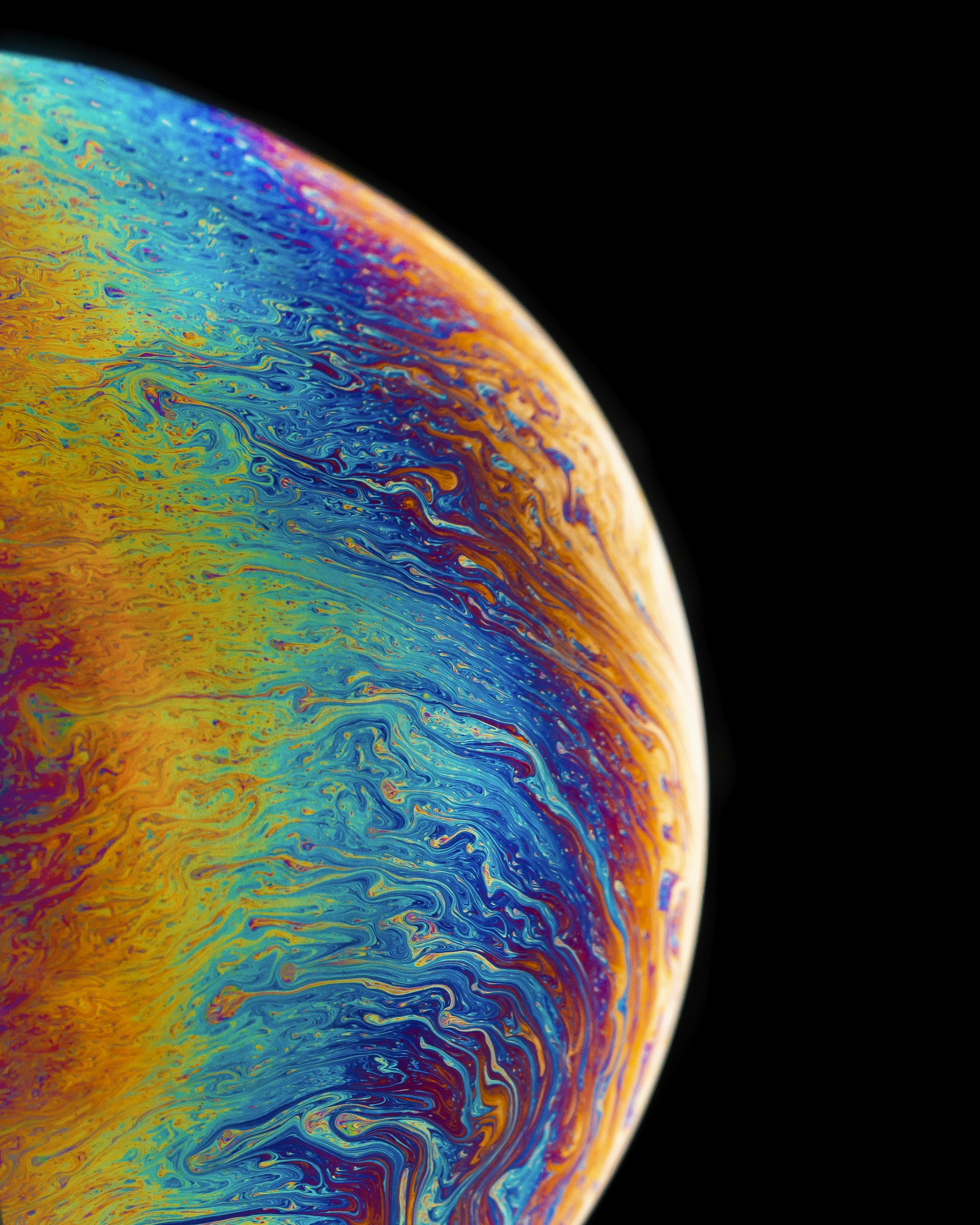multicolored planet fluid painting