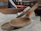 Image showing a handcrafted wooden spoon resting on a rustic kitchen table.