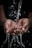 pouring water on person's hands
