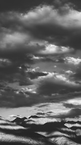 A striking black and white landscape photo showcasing depth and contrast.