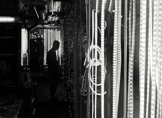 A dark, empty alley illuminated by soft ambient light, symbolizing a sleek social media approach.