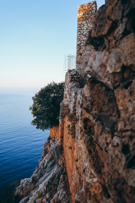 brown rock formation at daytime in Alanya Turkey