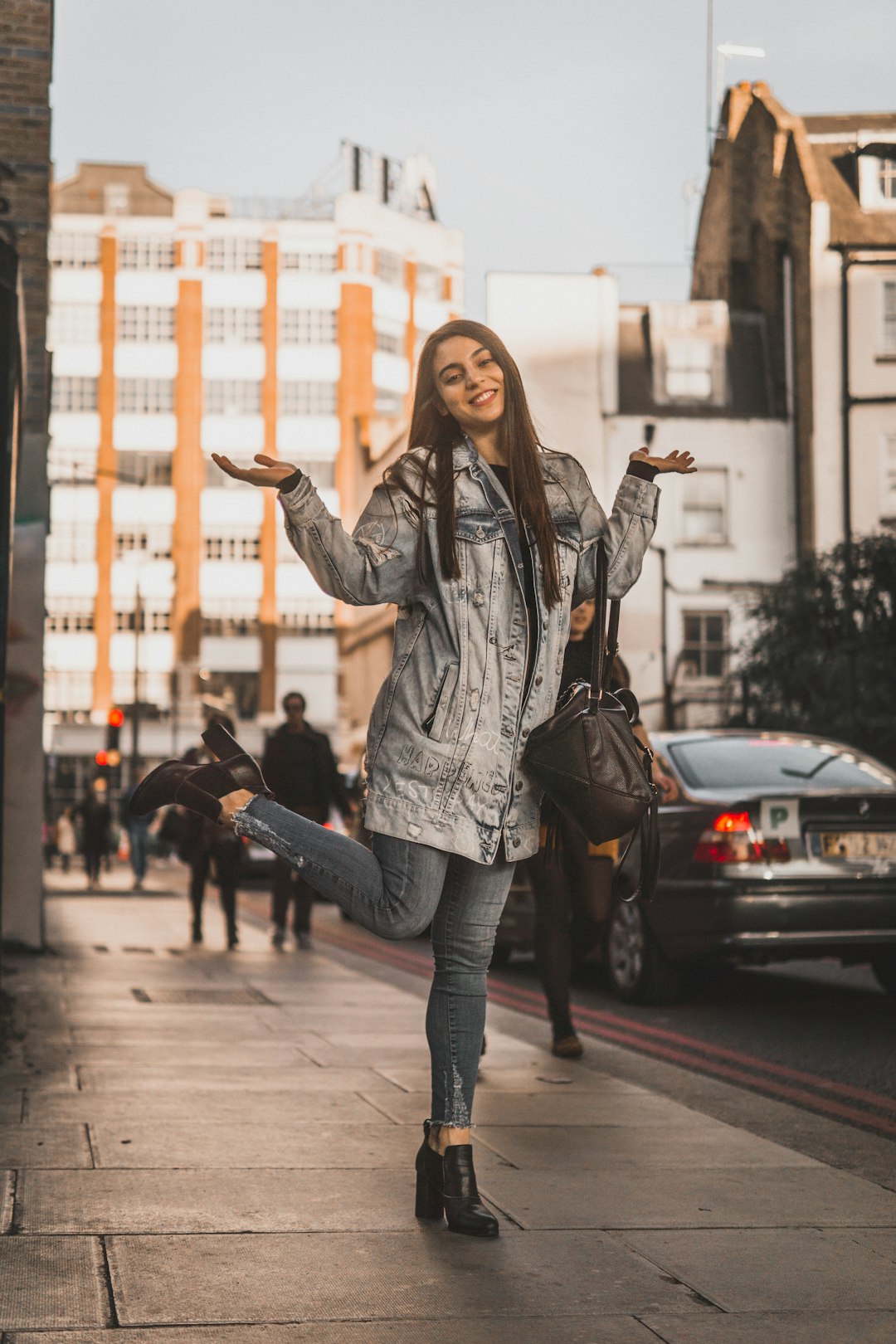 woman standing beside road