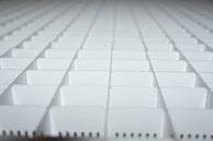 A close-up of the intelligent partitioning system organizing various sized items neatly.