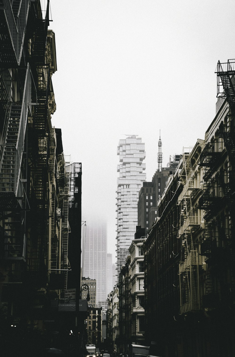 low-angle photography grey and black high-rise buildings