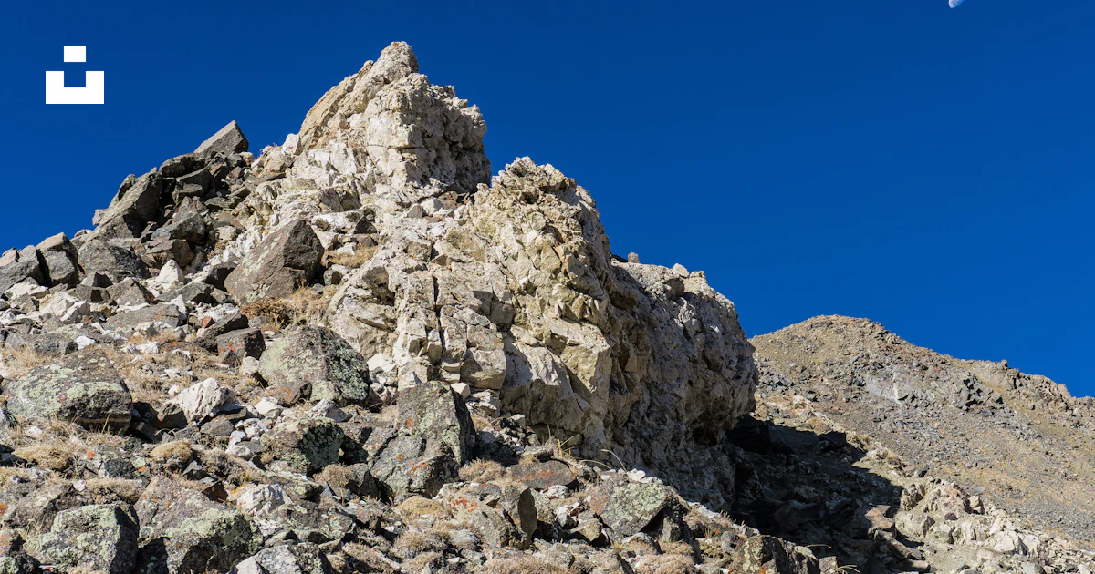 Gray rock mountain at daytime photo – Free Blue Image on Unsplash