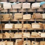 Artistic wooden plaques painted with vibrant patterns ready for display.