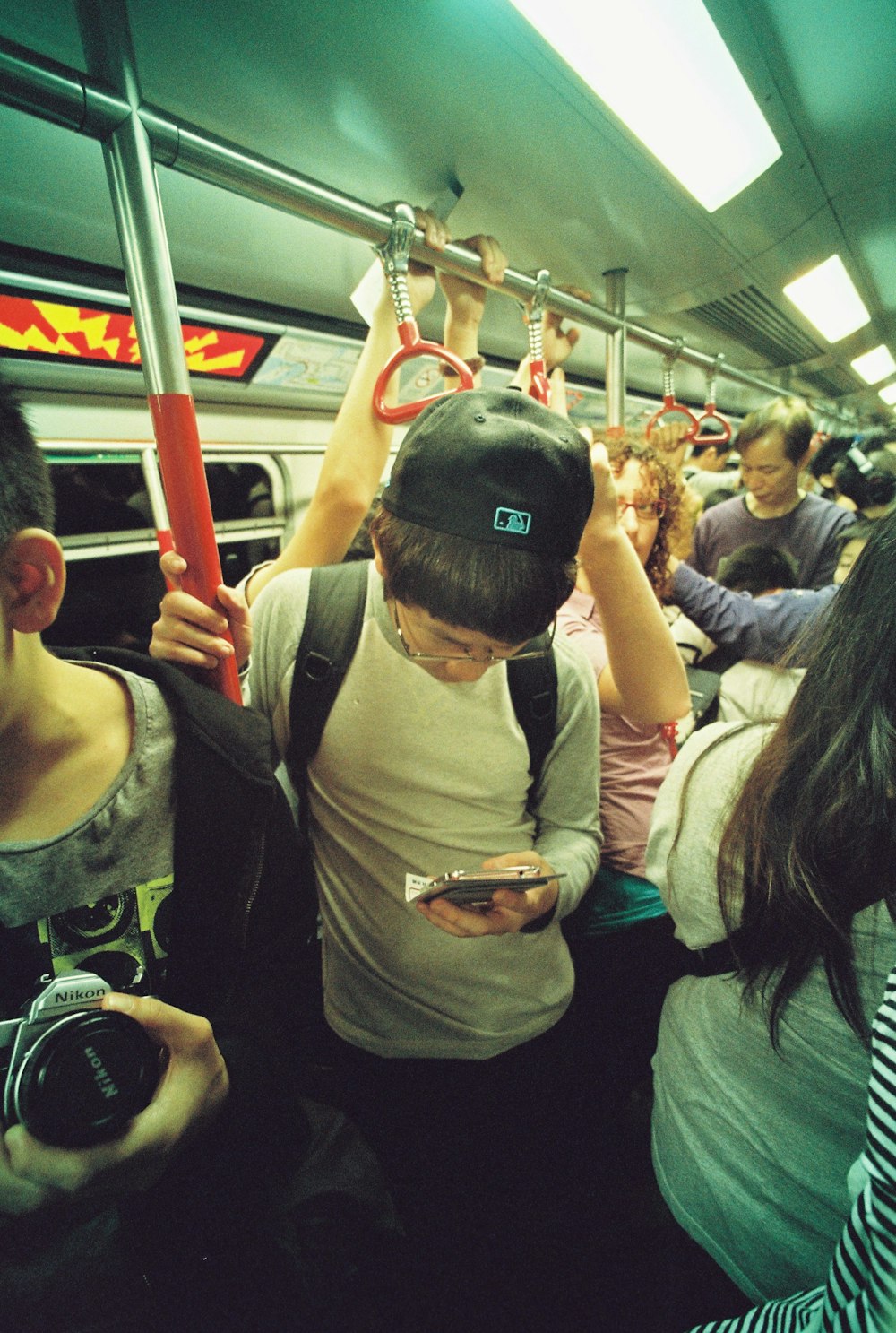 group of people riding inside train