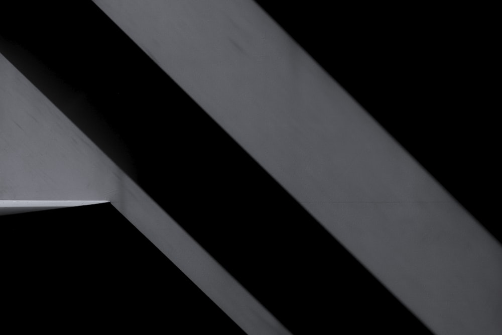 a black and white photo of a person on a skateboard