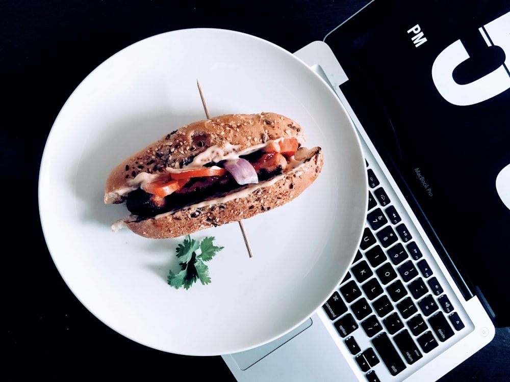 round white plate with burger