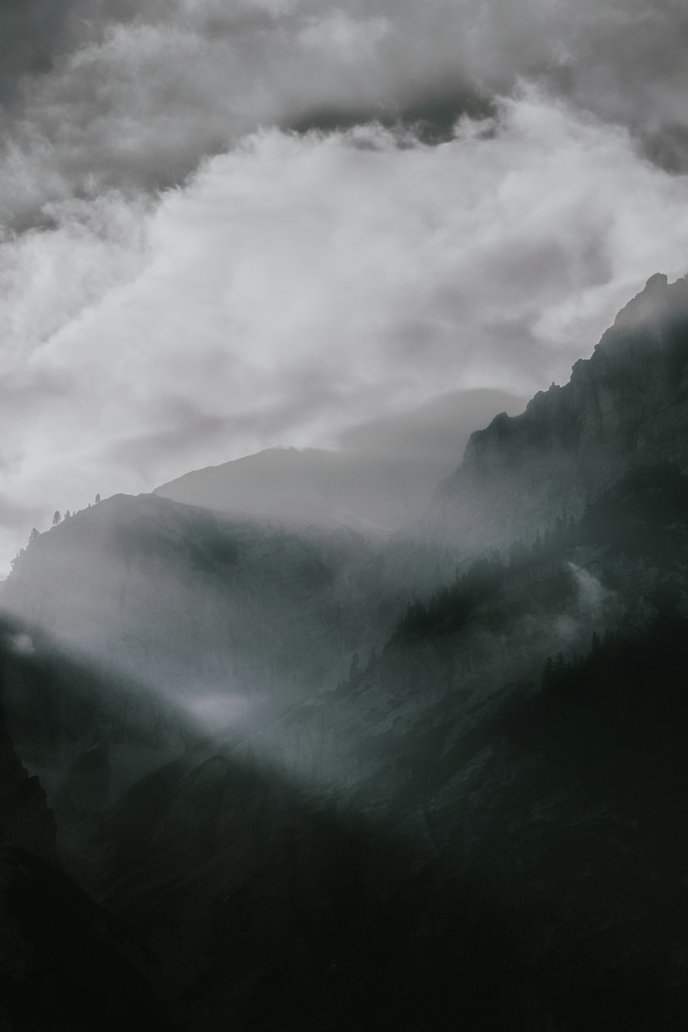 green mountain and clouds