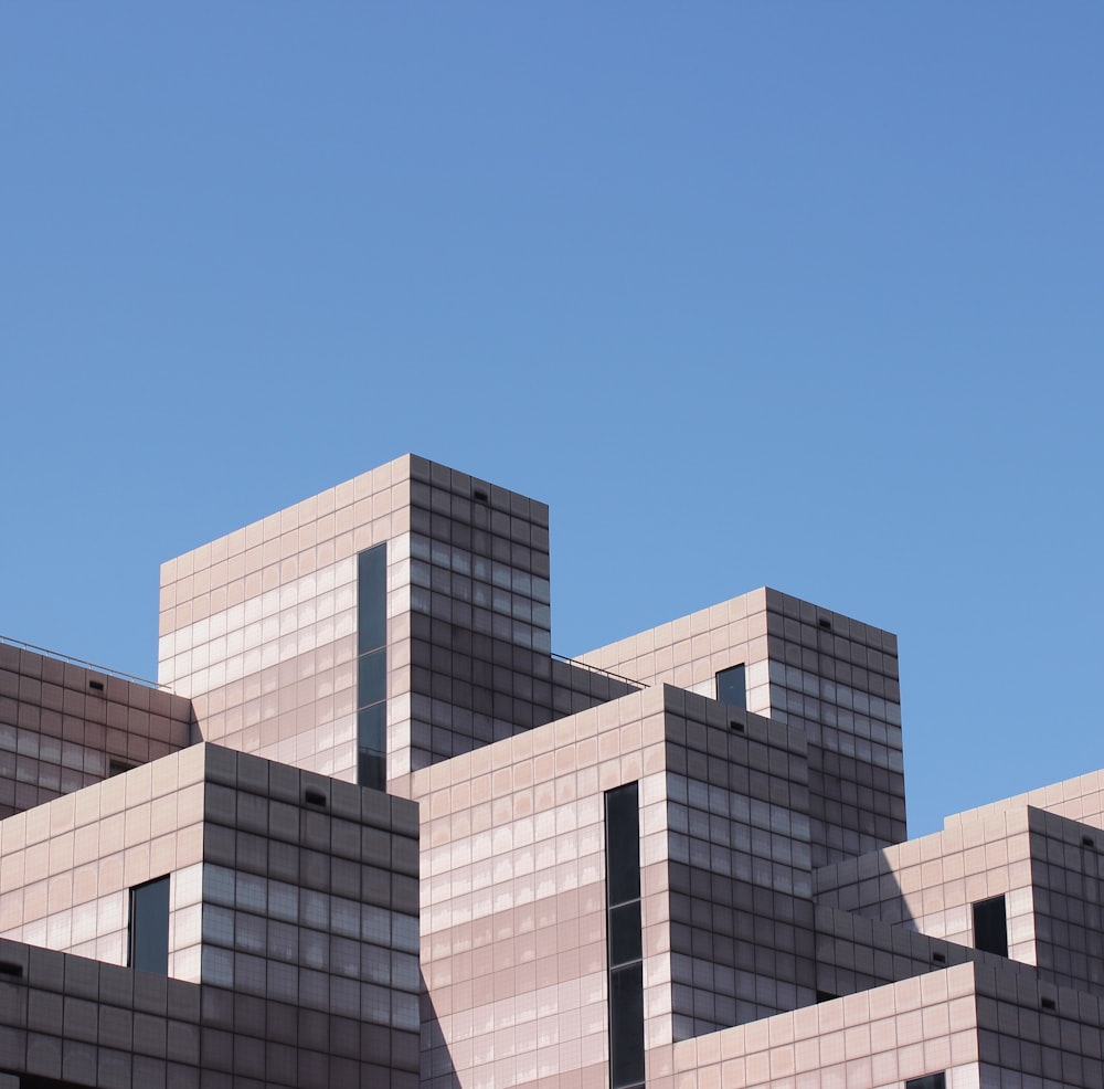 beige concrete high-rise building