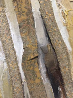 Side angle capturing the texture and depth of the masterpiece's layered paint.