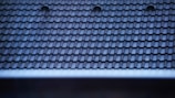 a close up of a roof with two holes in it