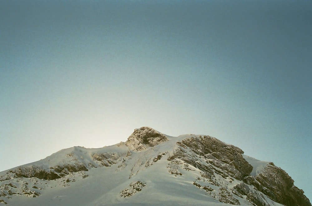 mountain filled with snow at daytime