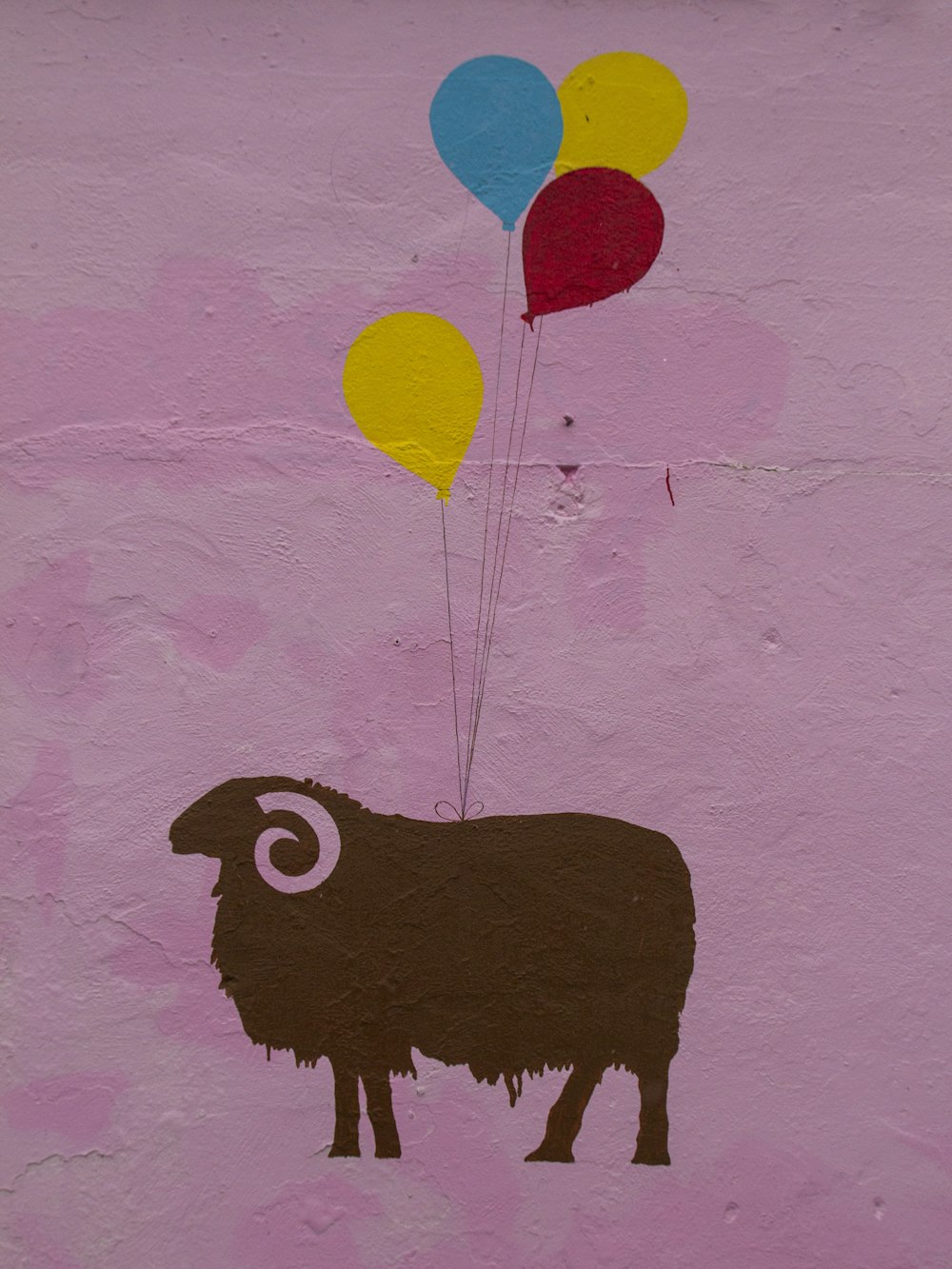 black animal with balloons painting