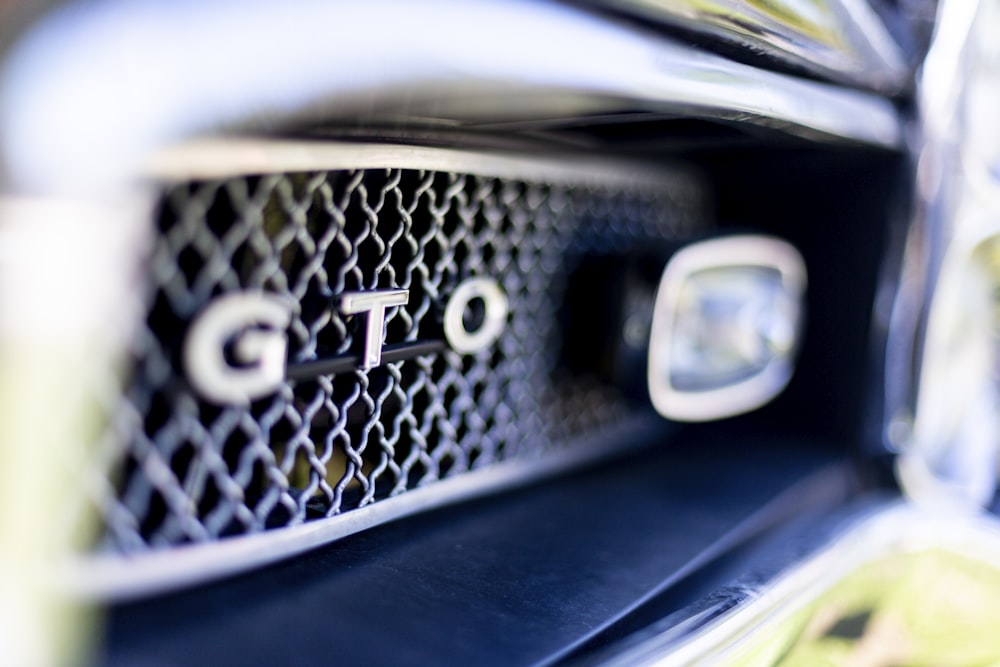 close-up photography of gray GTO vehicle