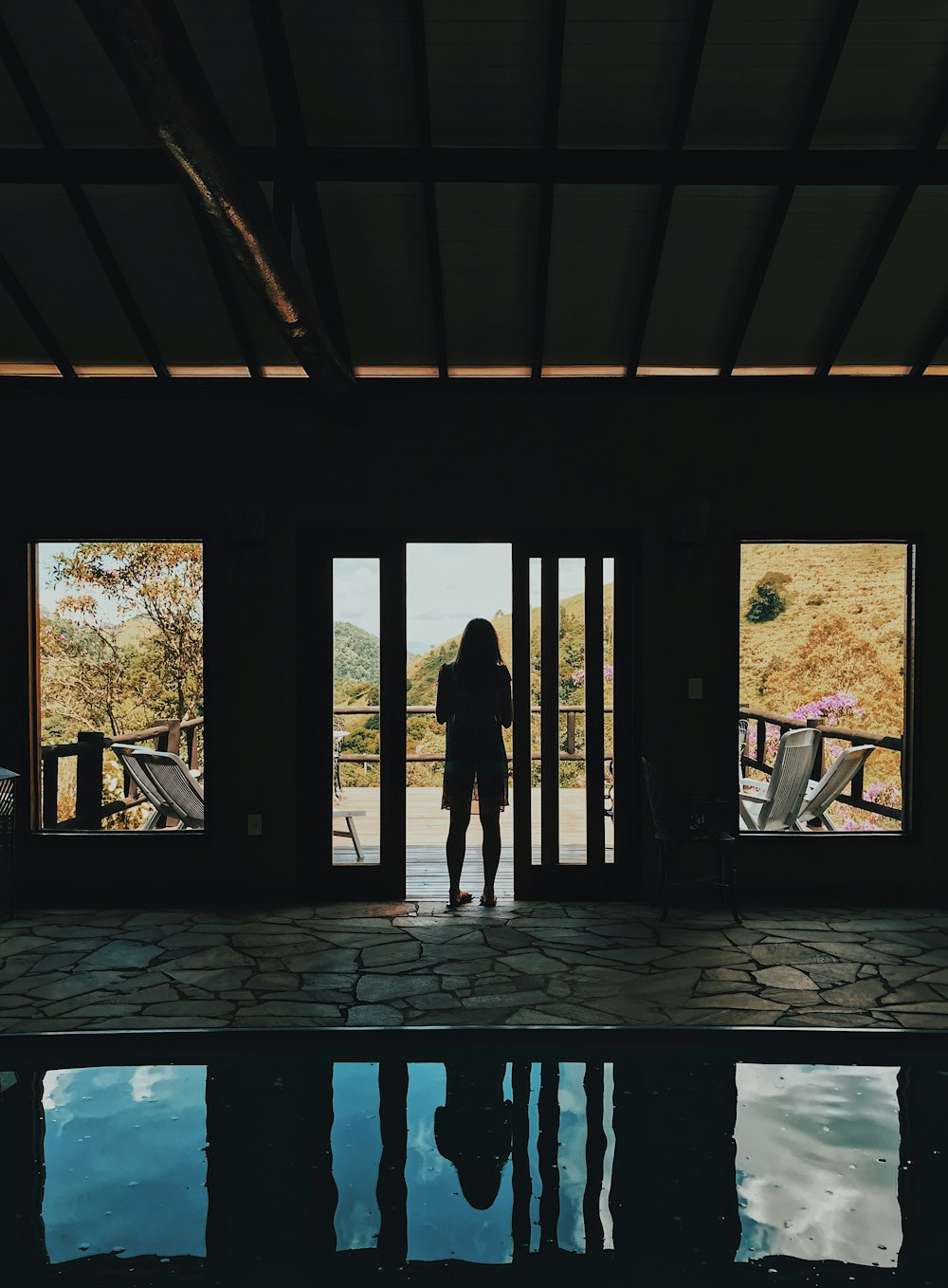 person standing near the door photography