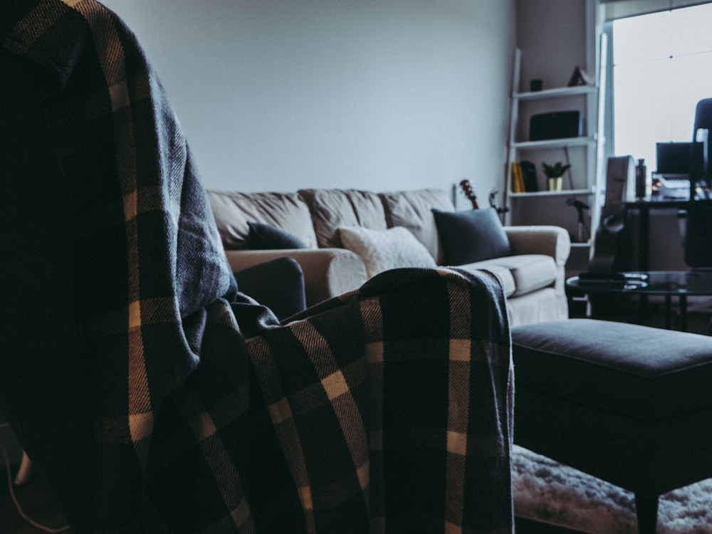 white and black plaid textile