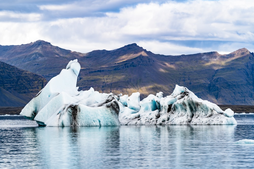 iceberg overlooking mountain range