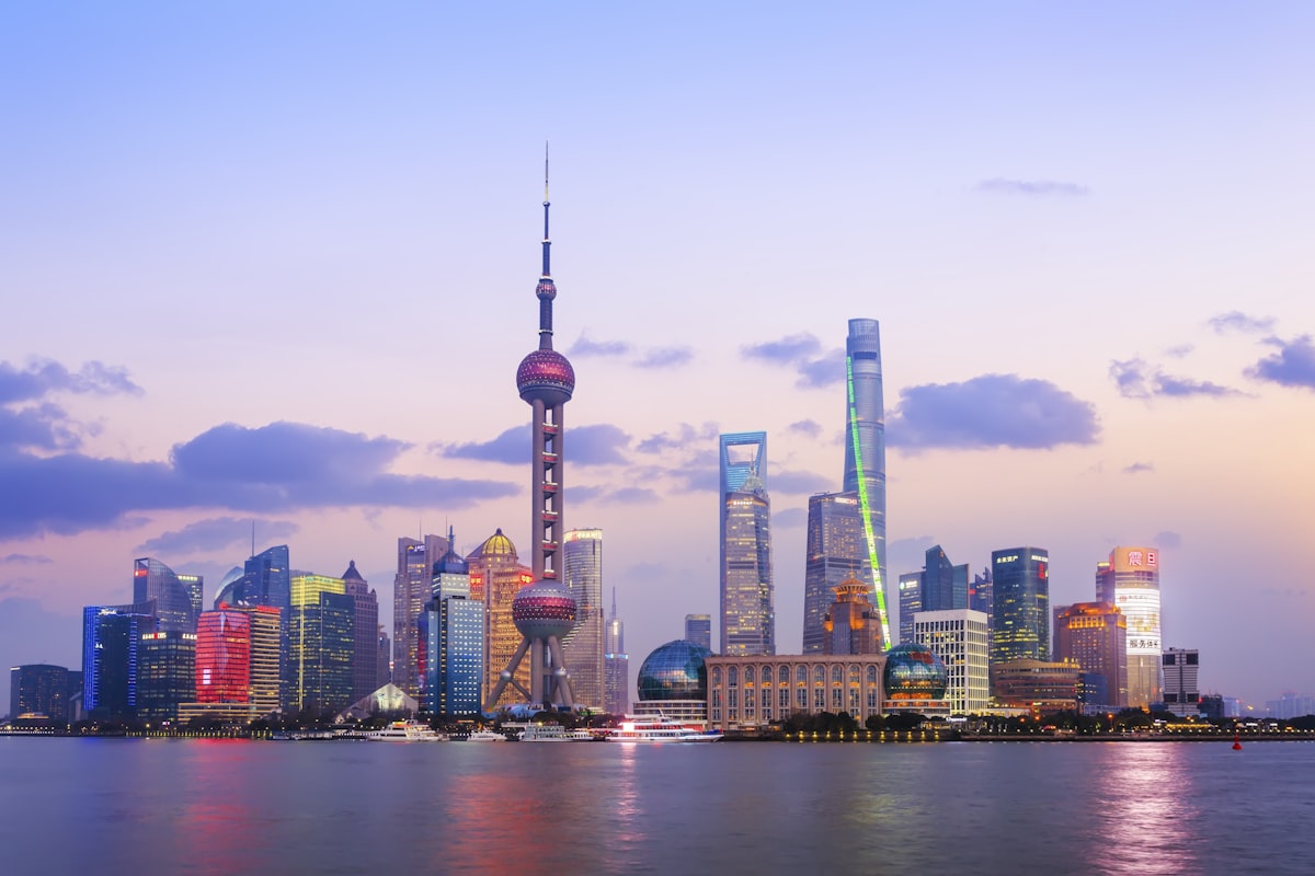 Modern Shanghai skyline with Pudong financial district at dusk representing the scale of China's e-commerce market