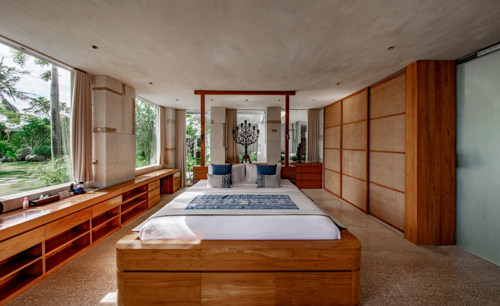 brown wooden bed and white mattress