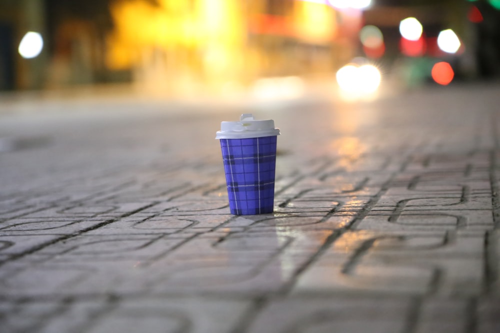 blue disposable cup photography