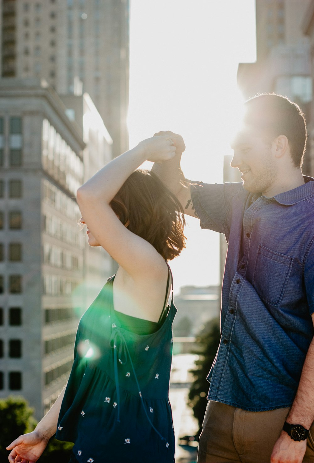 man holding hand of woman