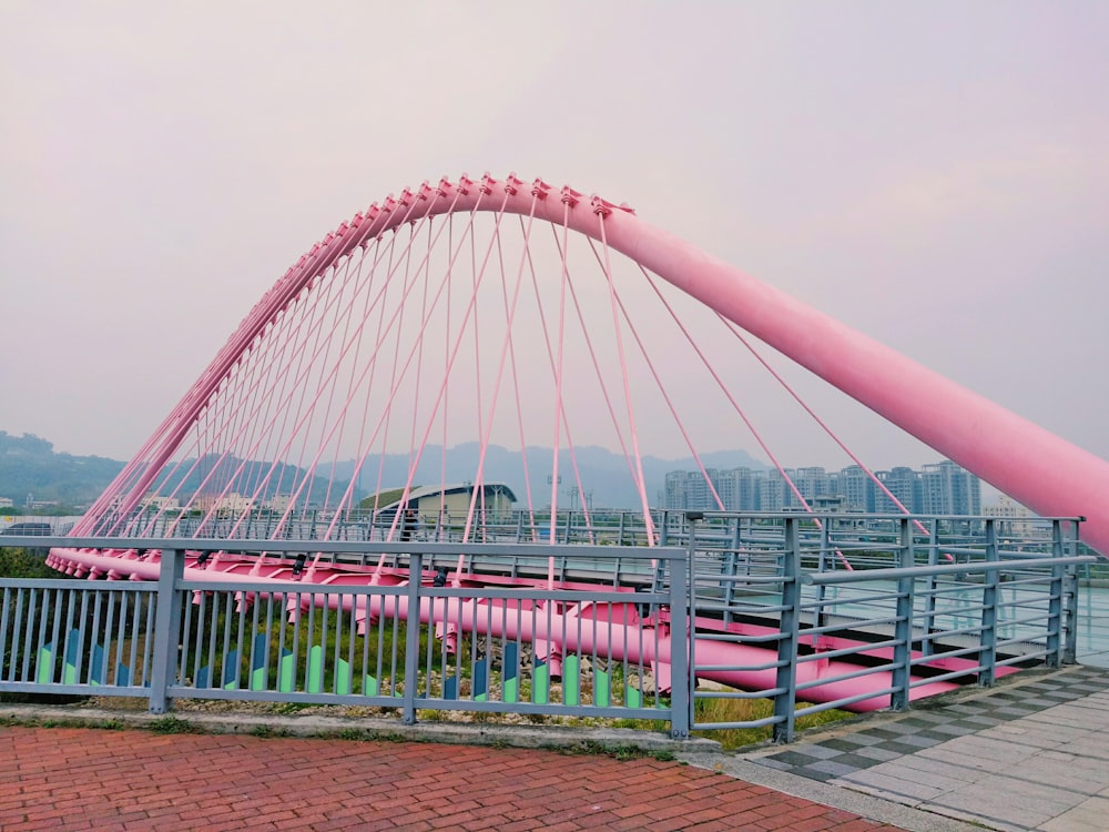 pink suspension bridge illustration
