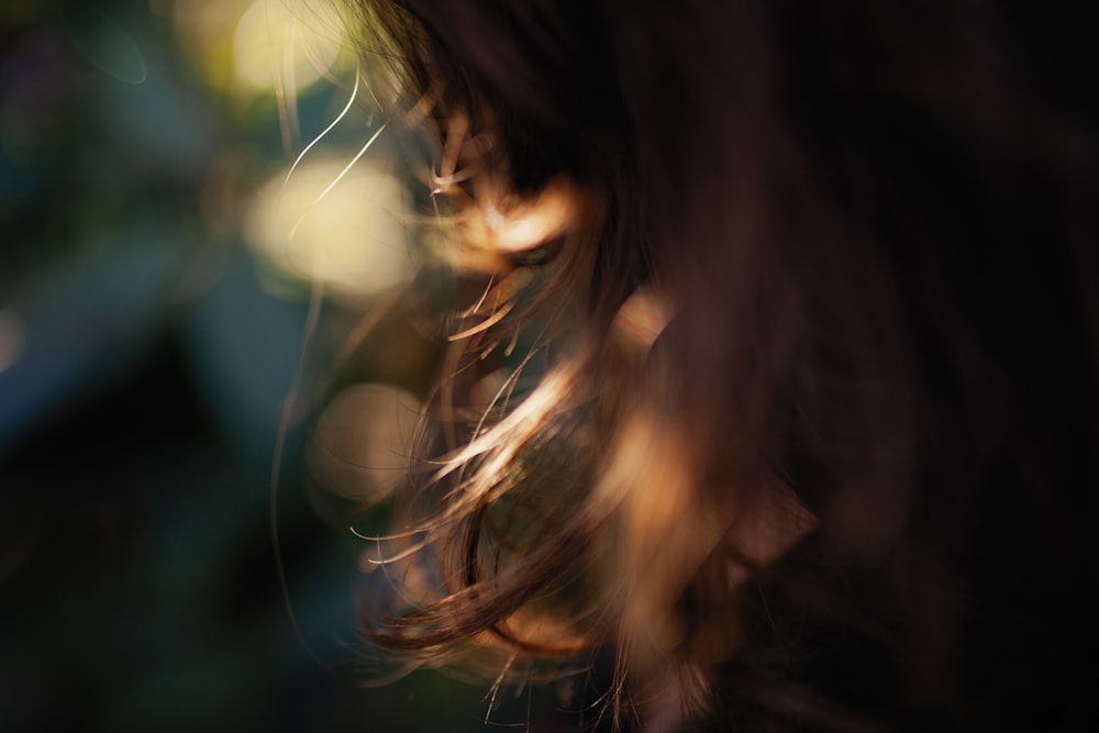 a blurry photo of a woman's face