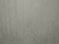 Close-up of textured wallpaper showcasing intricate design and premium quality.