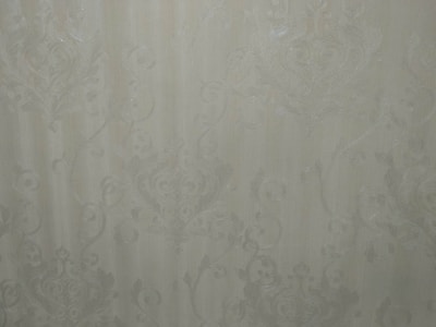 Close-up of textured wallpaper showcasing intricate design and premium quality.