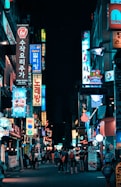 buildings with pathway surround by people