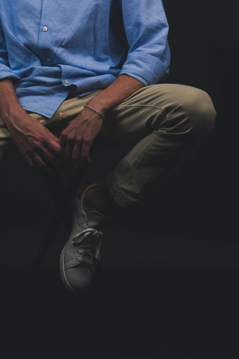 man wearing blue dress shirt