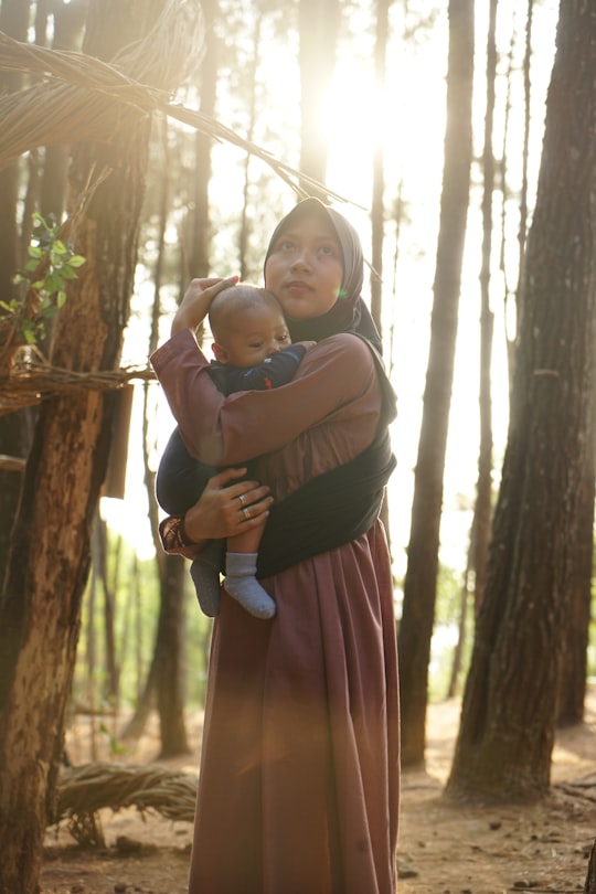 woman holding baby in Yogyakarta City Indonesia