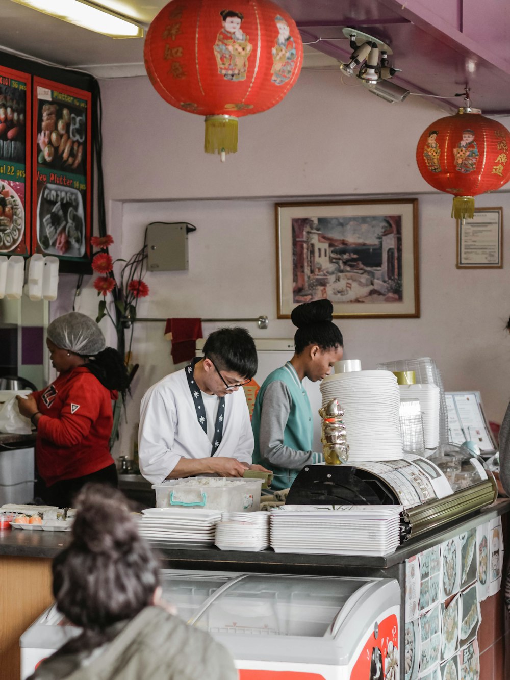 people behind counter table