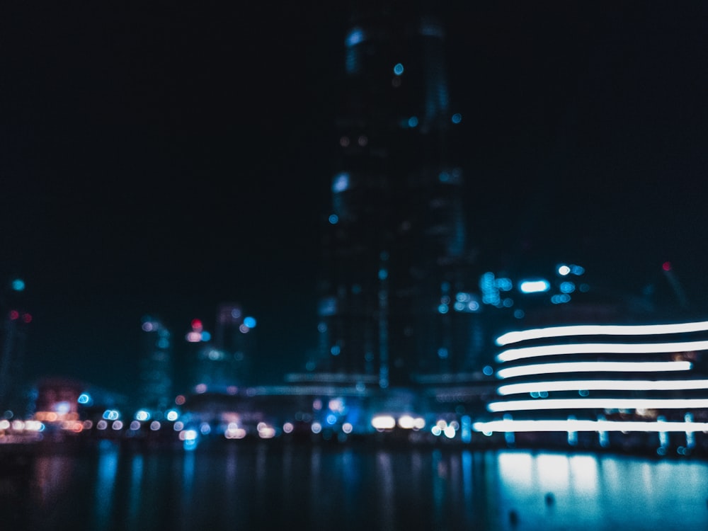 a blurry photo of a city at night