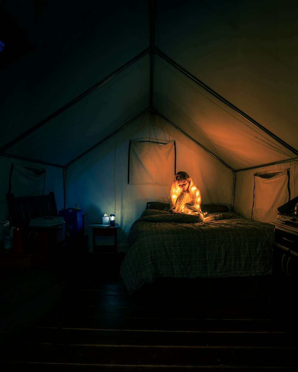 woman sitting on bed