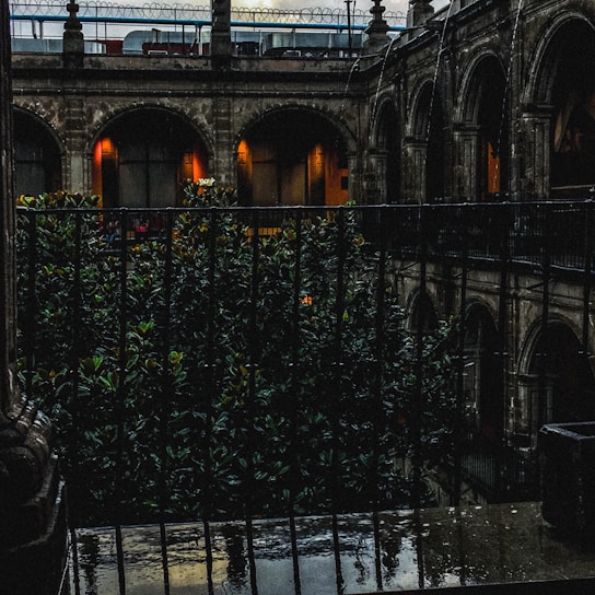 A cozy courtyard of a traditional Varanasi guesthouse bathed in warm morning light.