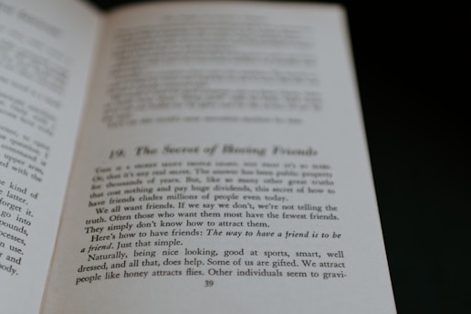 An open book displaying text on its pages. The text appears to discuss themes related to making friends, with phrases suggesting insights on the topic. The visible page is marked with a large chapter or section number and a title.