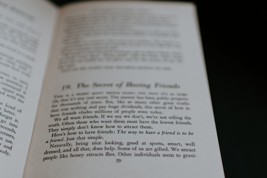 An open book displaying text on its pages. The text appears to discuss themes related to making friends, with phrases suggesting insights on the topic. The visible page is marked with a large chapter or section number and a title.