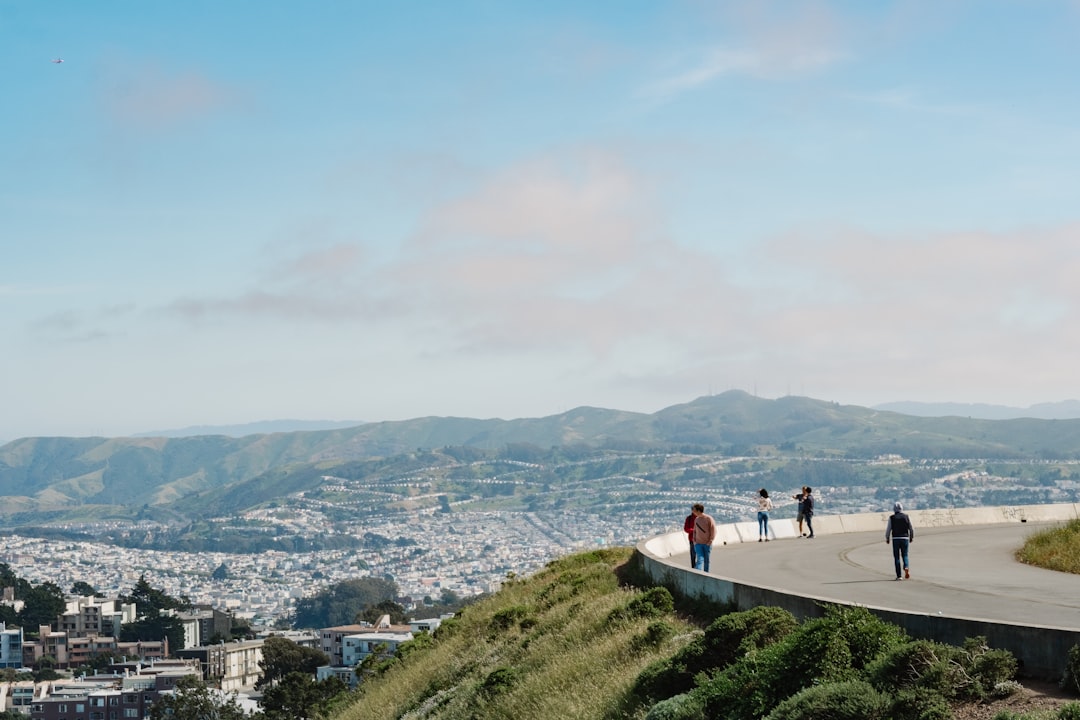 people over looking mountains during daytime