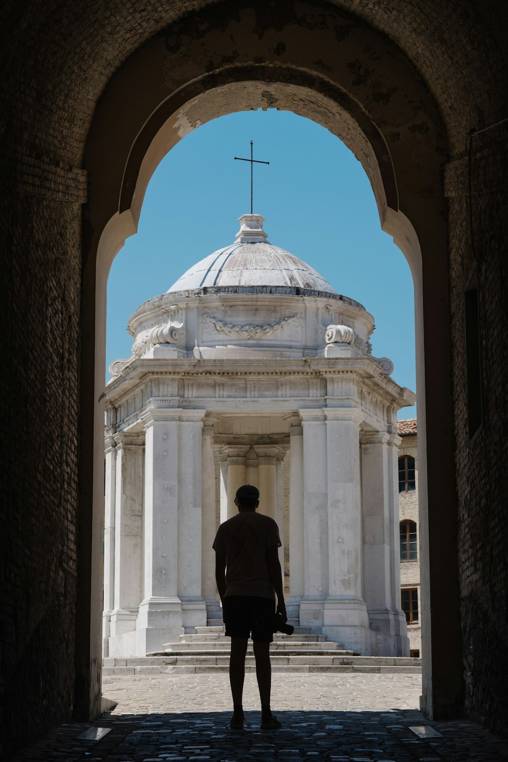 person standing near church