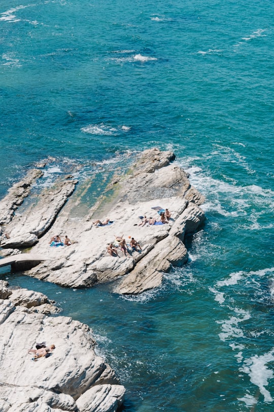 group of people on islet in Ancona Italy