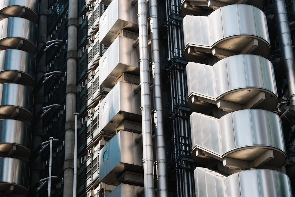 low-angle photography of gray and black building during daytime