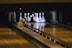 bowling balls hitting pins