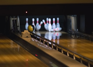 bowling balls hitting pins