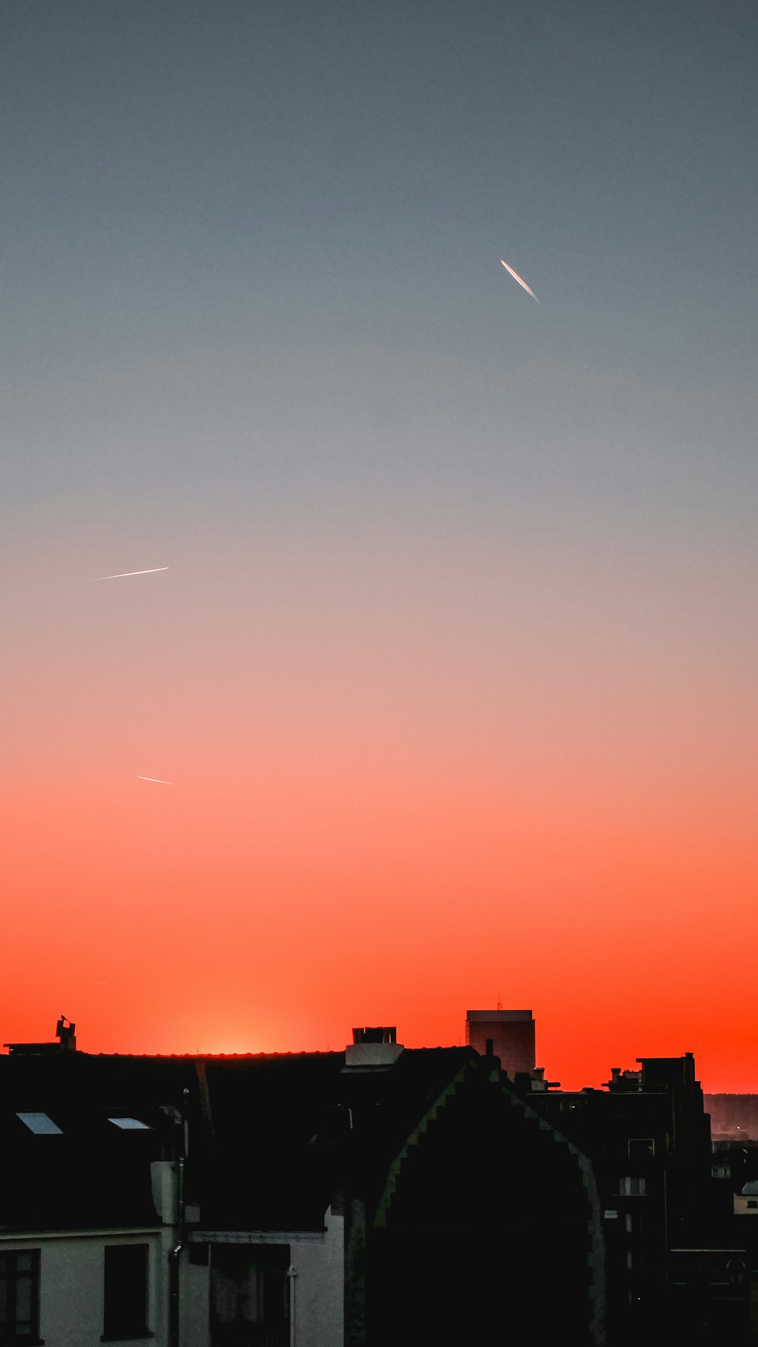 silhouette of buildings during sunset